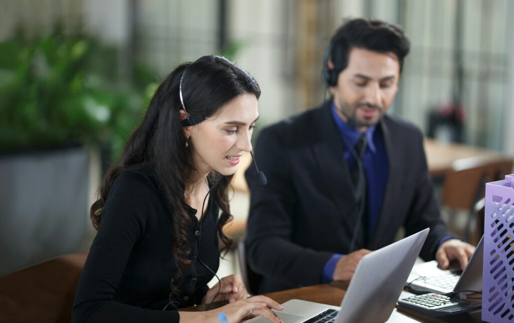 business support on telephone in office. young business people chatting in start up office