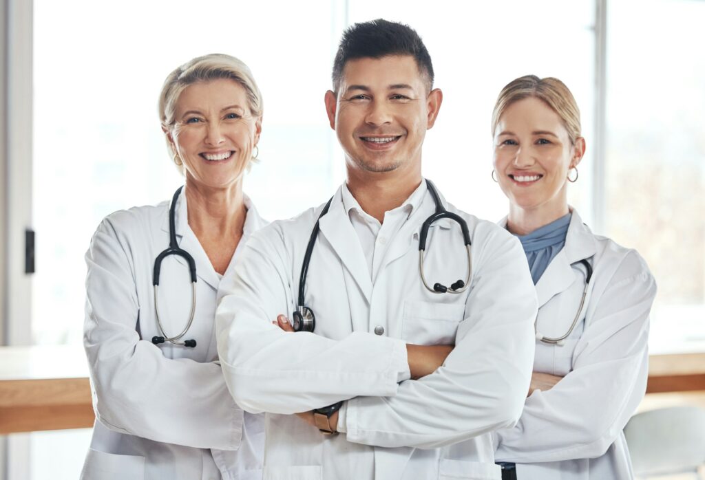 Healthcare, hospital and portrait of doctors with smile for wellness, medical service and support.