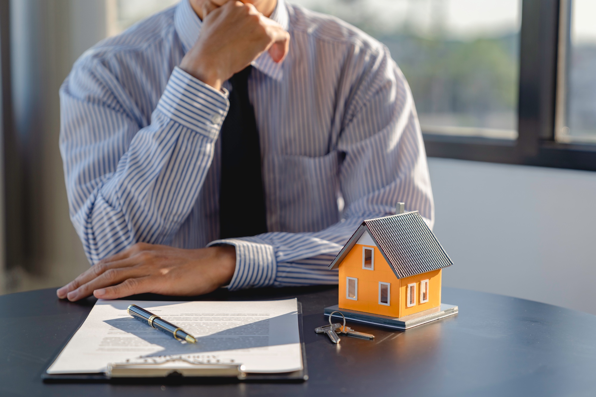 Home buyers are thinking before they sign that document. Land salesperson submits land mortgage cont